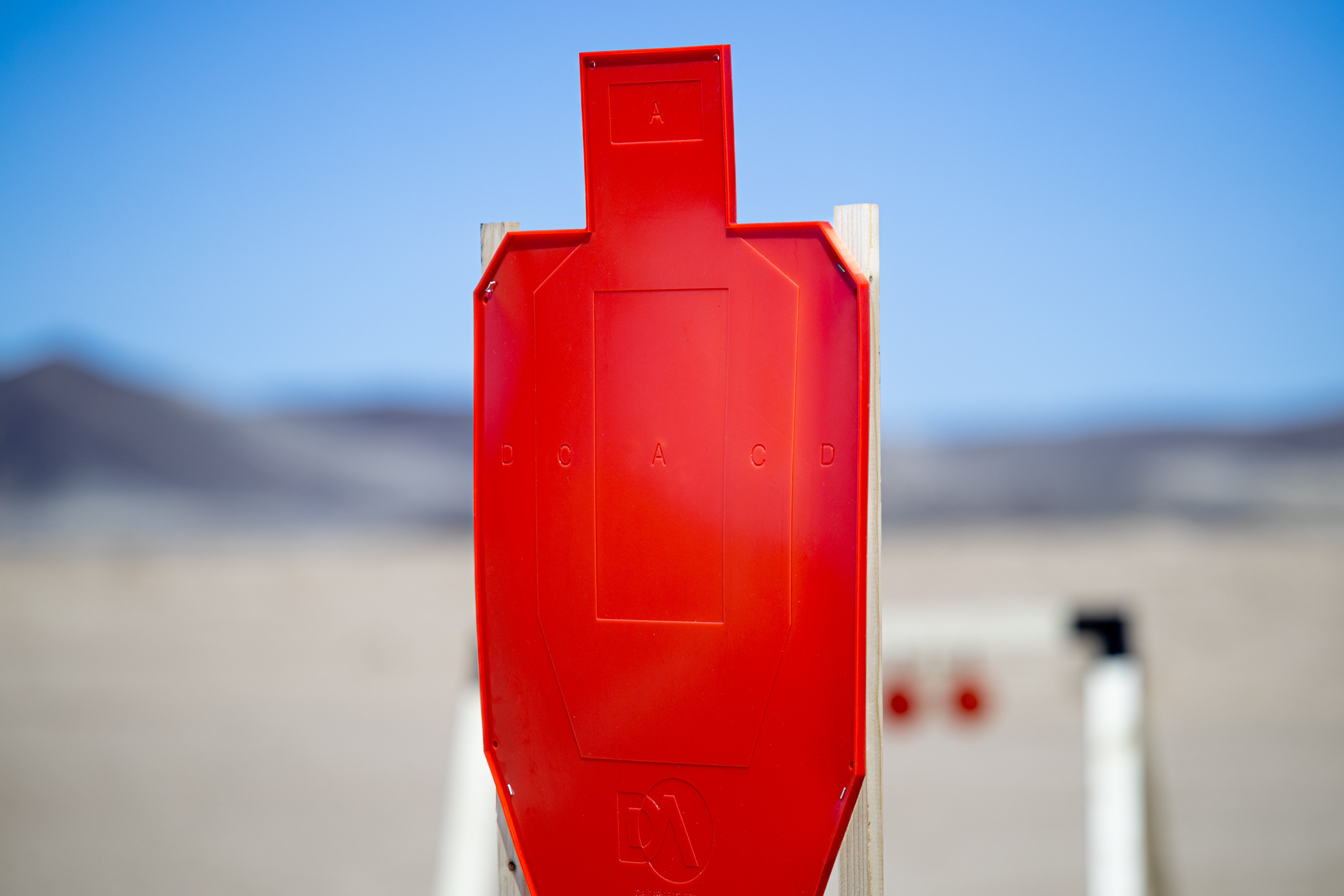 red full size silhouette target with a c d zones