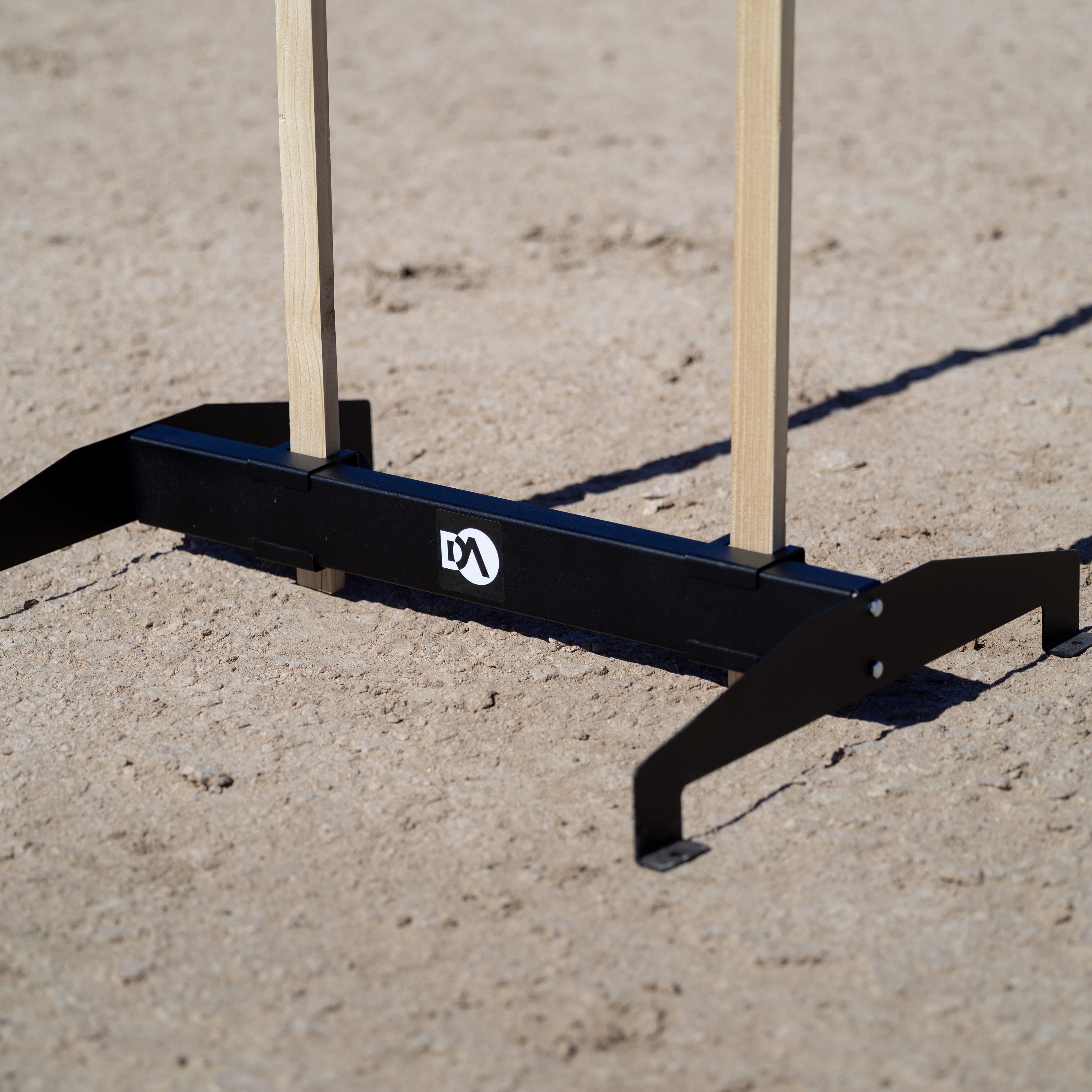 Adjustable Target Stand designed for holding 1x2" furring strips, providing a stable shooting platform.