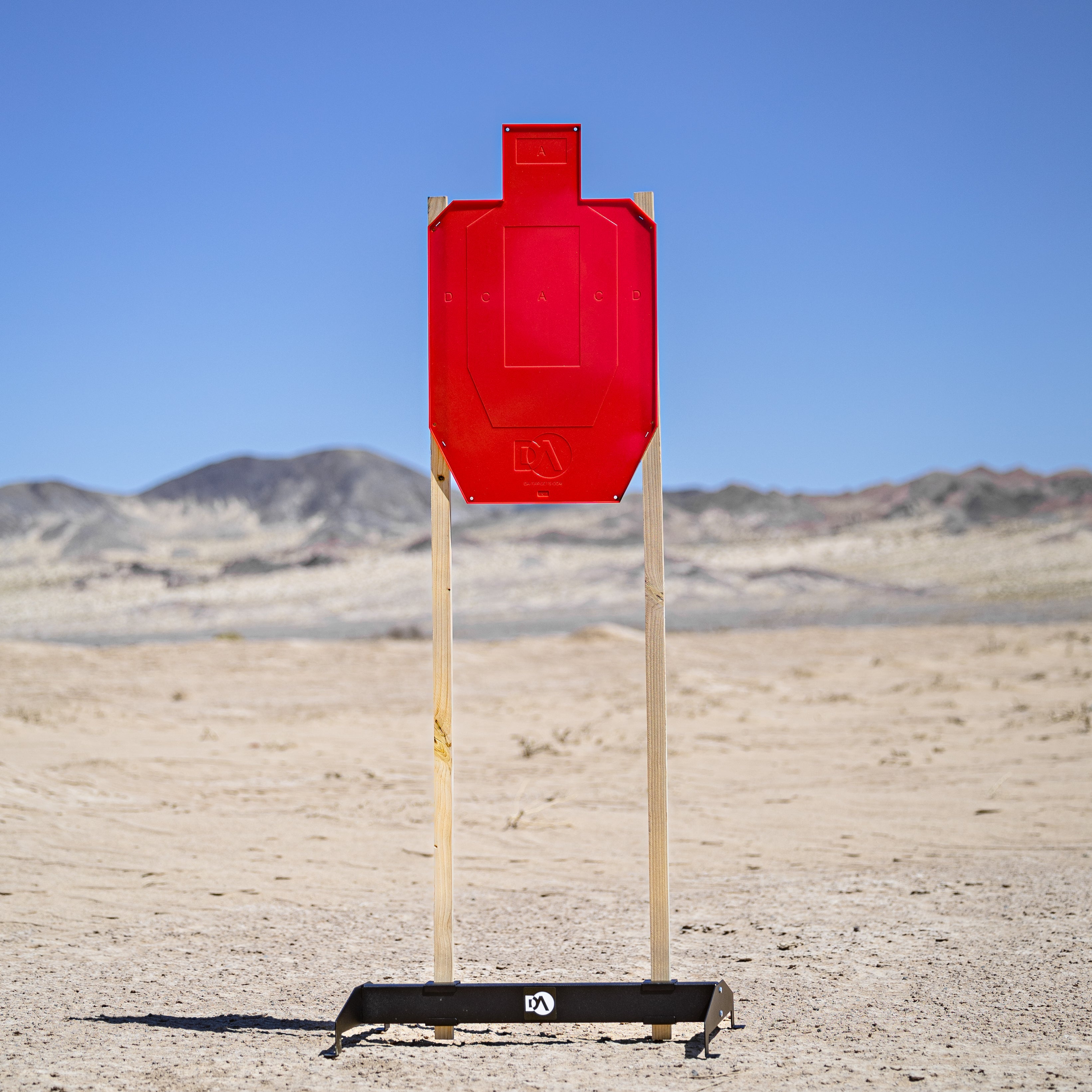 Regulation size Full-Size Silhouette Color-Changing Target that visually indicates shooting impact with vibrant color changes.